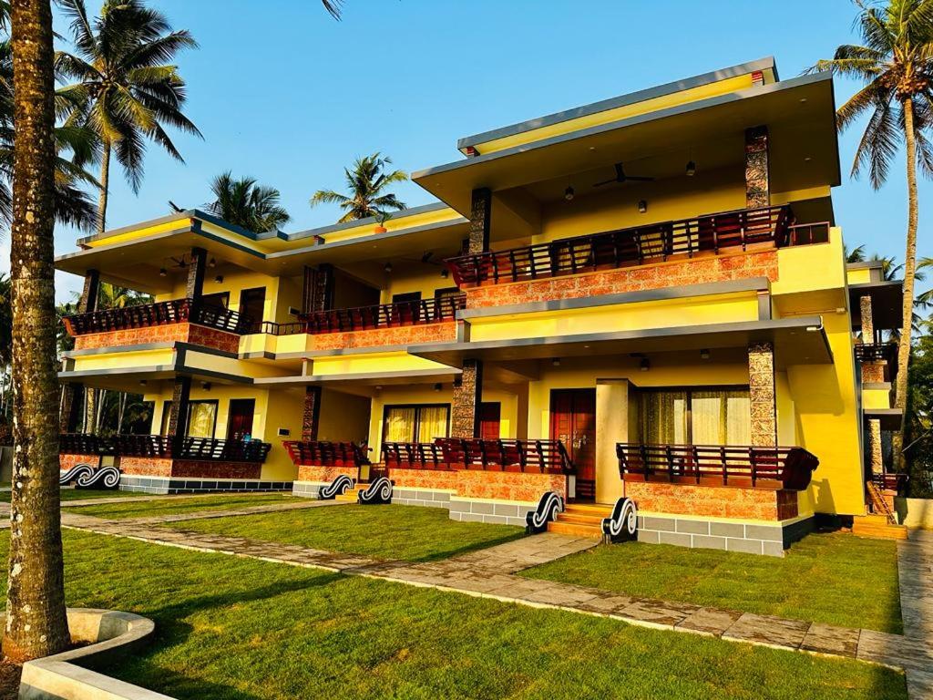 Maadathil Beach Resort