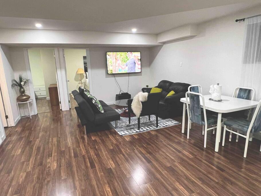 New Entire 2 bed suite/garage parking/close to HWY