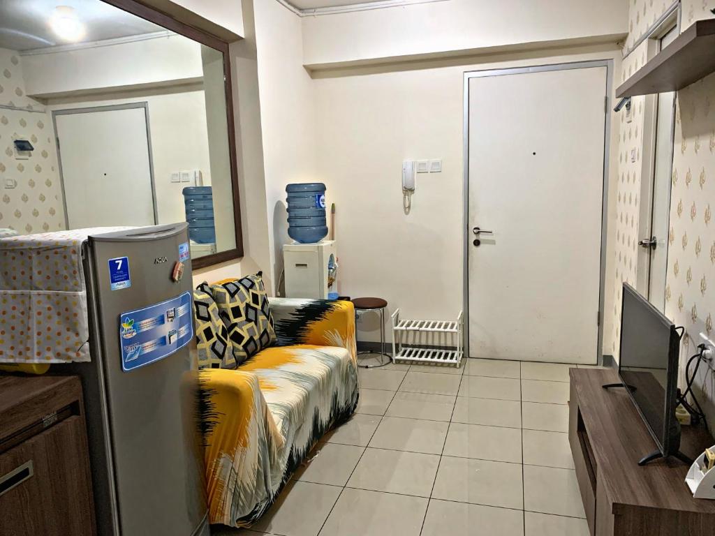 Homie 2BR at Green Bay Pluit Apartment