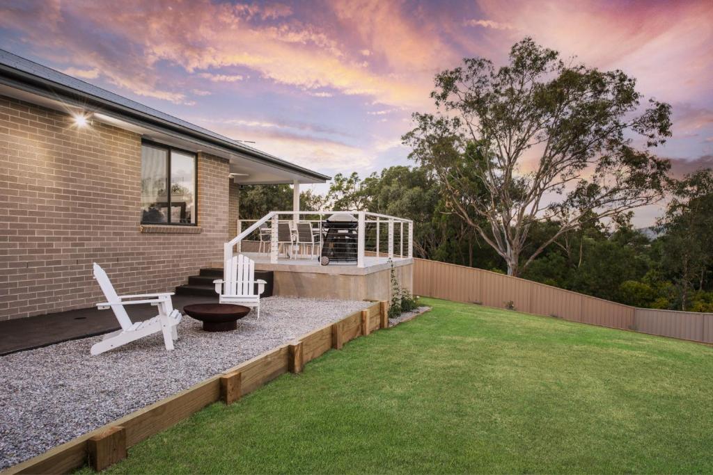 Spacious 4-Bedroom Home with a BBQ and Firepit