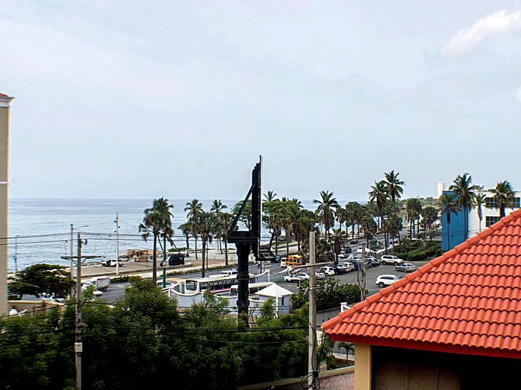 Malecon Rooms y Hotel
