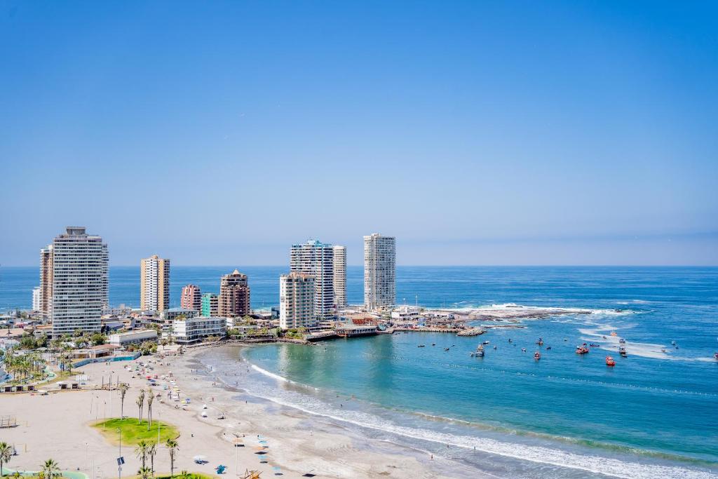 Departamento grande frente a playa Cavancha