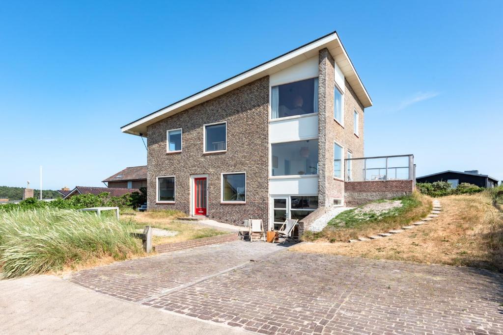 Zeezicht Villa Strand direct bij zee