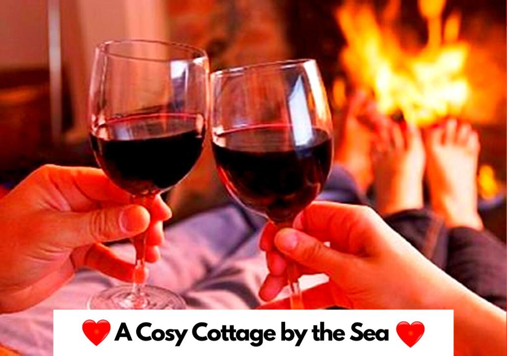 Fisherman's Cottage - It's as Romantic as Romantic can be! You'll fall in Love with this Cosy Lakeside Cottage just a few steps from the Beach! Snuggle up to the Log Burner & Unwind! Where the Beauty of Nature meets the Warm Comfort of Home!