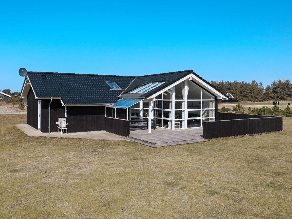 10 person holiday home in L kken