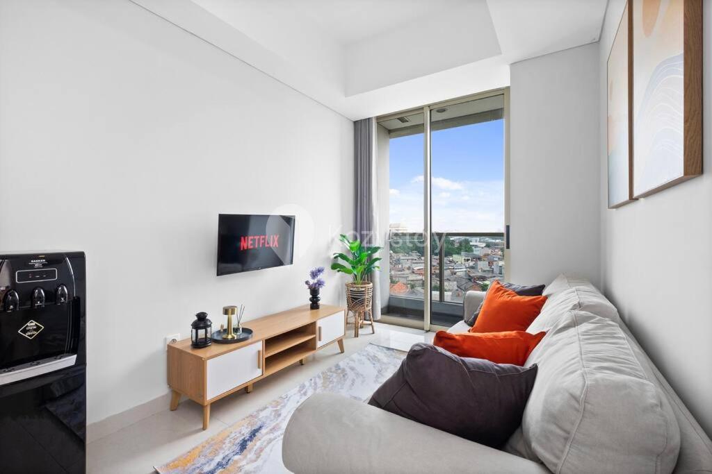 Sunela by Kozystay 2BR Next to Mall Grogol