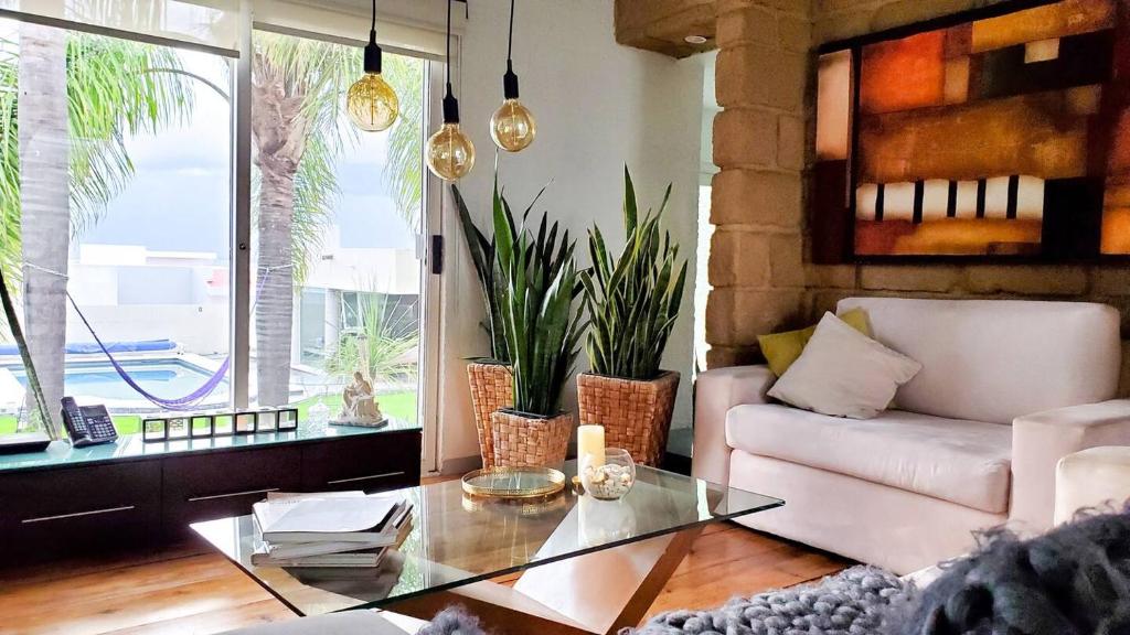 Casa con alberca privada, asador, jardin, palapa
