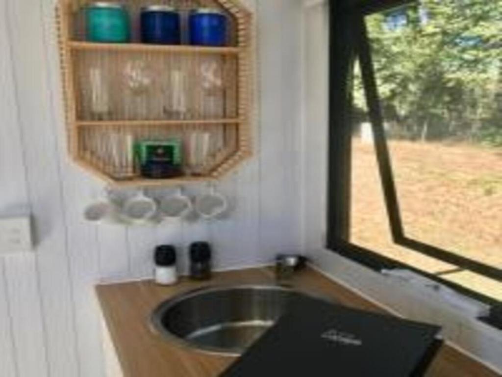 White Jacaranda Tiny House